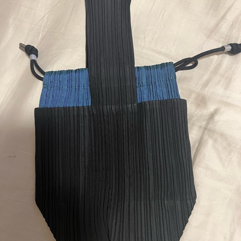 Vintage 1998 Issey Miyake light weight small hand bag. Dressy and or casual.